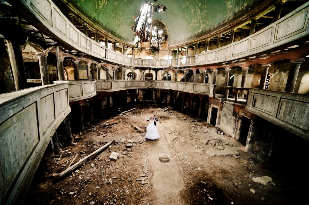 hero background photo of a couple dancing in a old theater building